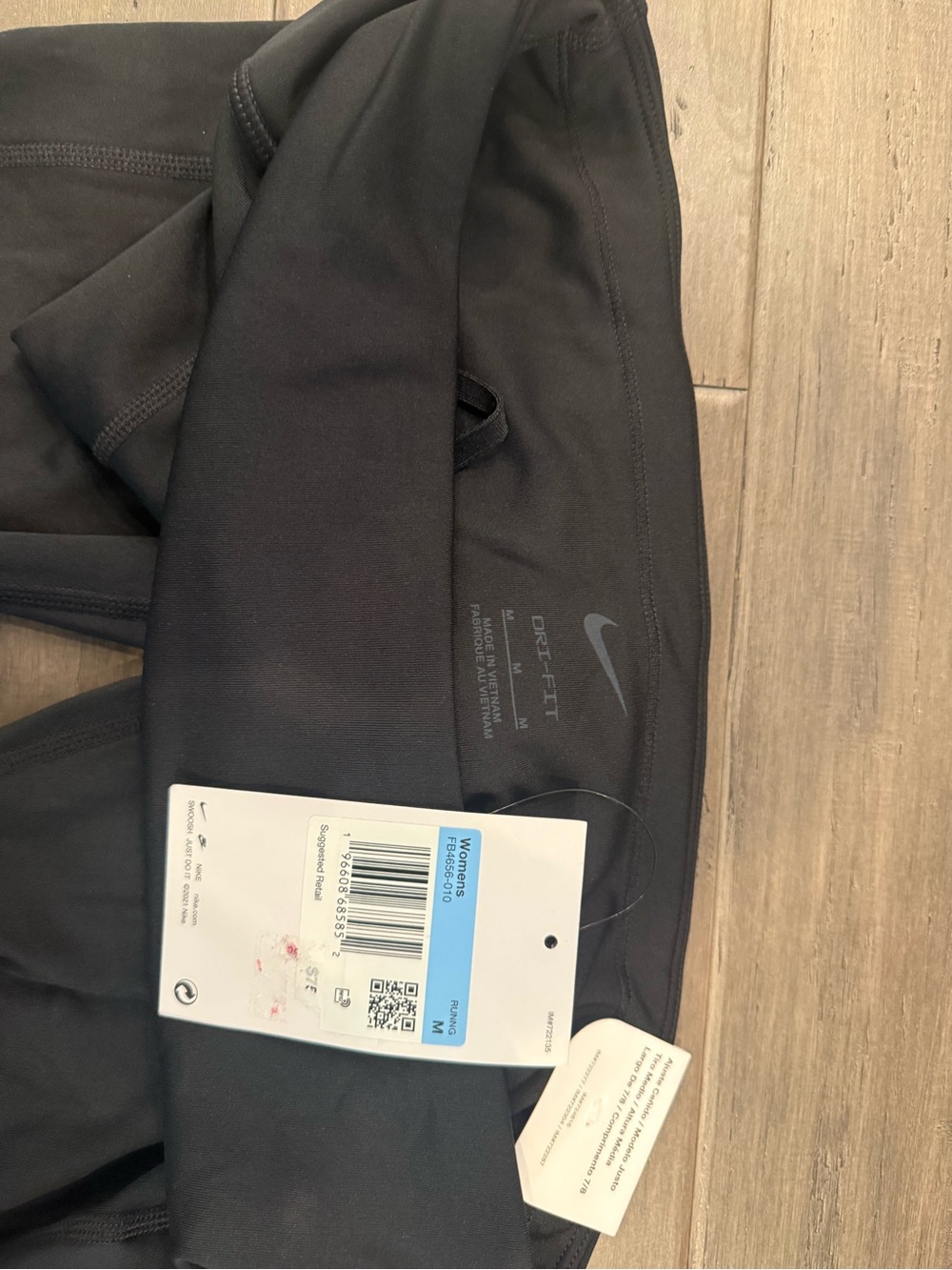 Nike Black Fast Mid-Rise 7/8 Tight Fit Leggings - Picture 4 of 4
